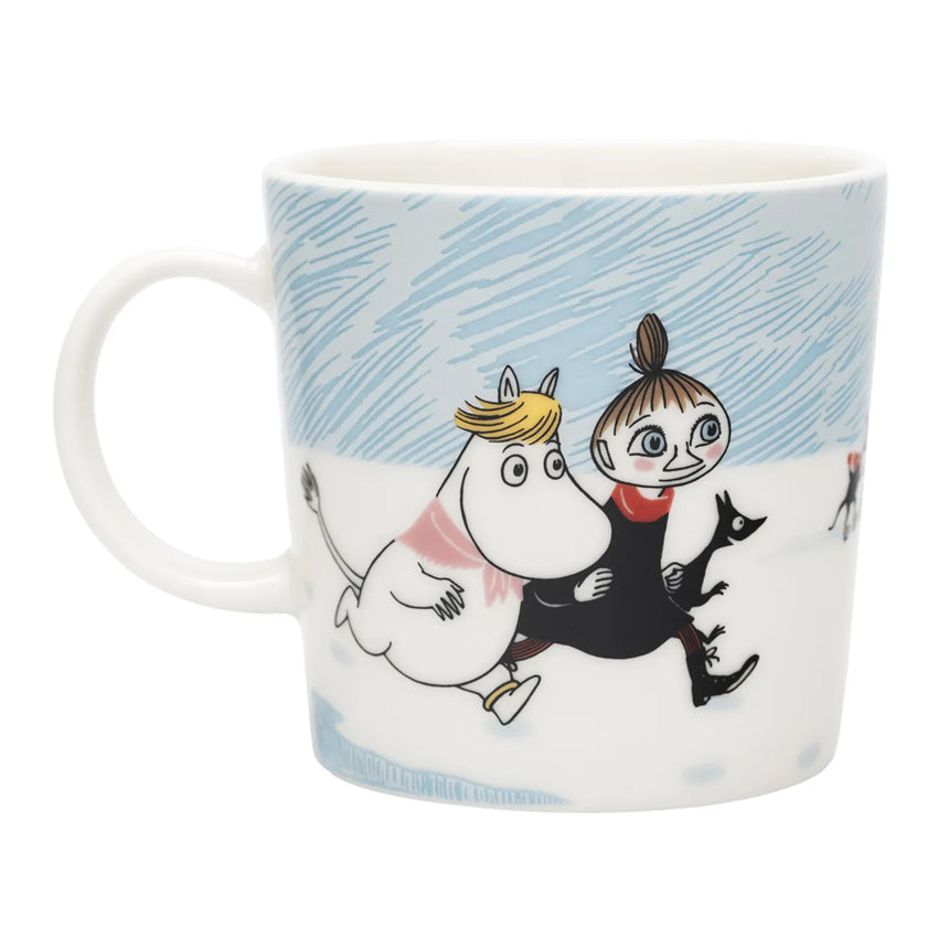 Moomin Arabia Ice Swimming mug 2025 featuring Moomintroll, Little My and winter scenery
